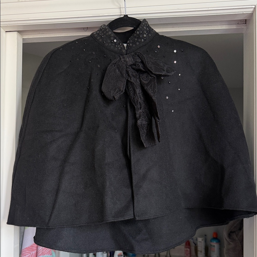Elegant Black Cape with Bow Detail
